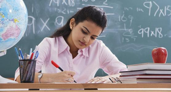 Teacher working at her desk