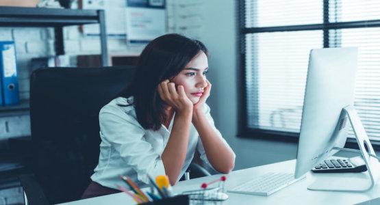 Woman feeling overwhelmed at work